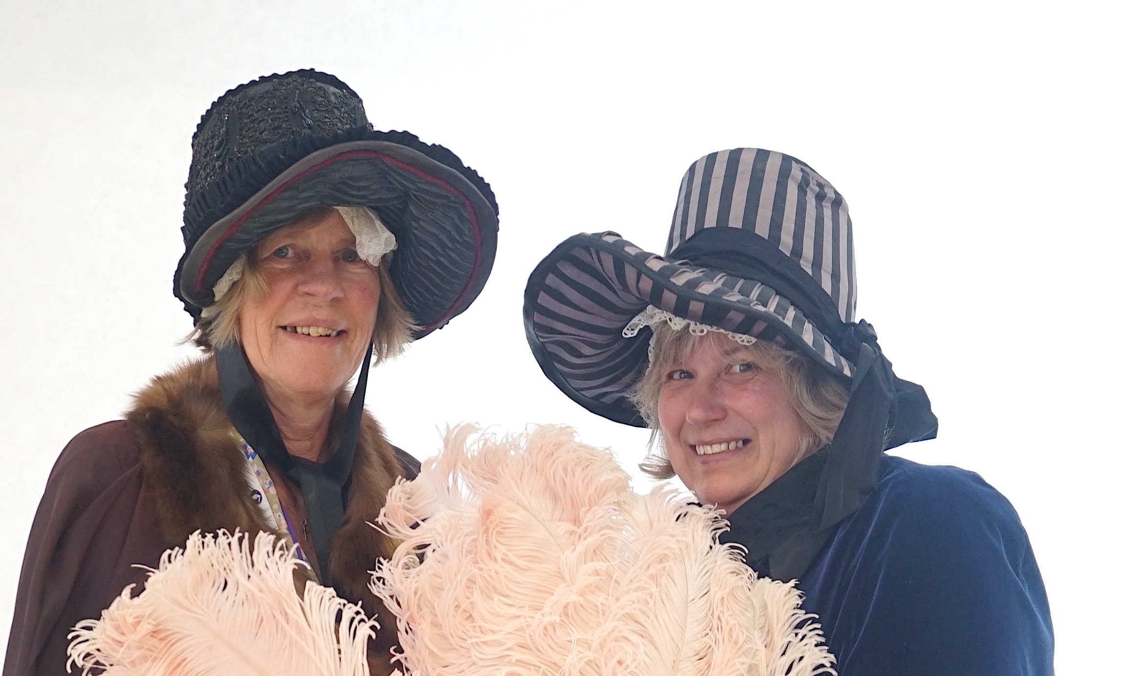 Two lady's Victorian style bonnets, silver and black striped and the other silver black with jet trim. Ex Royal Opera House 'The Damnation of Faust'